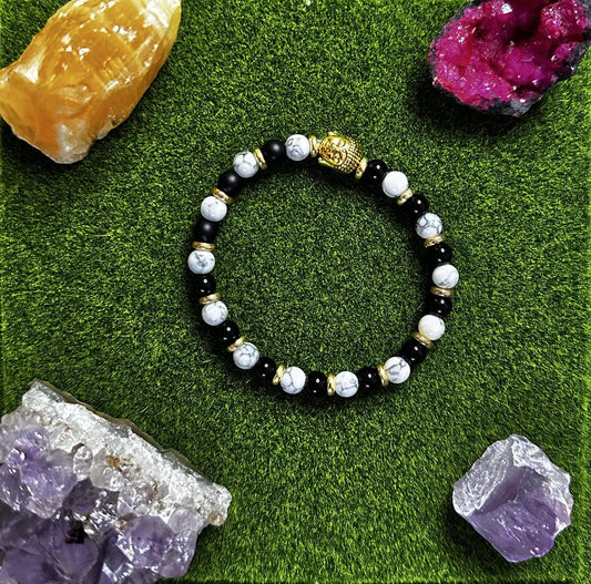 Bracelet Onyx noir et Howlite avec Bouddha doré